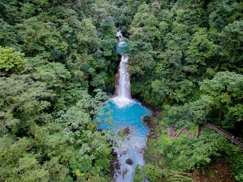 waterfall in the middle of costa rica jungle - best sun winter destination