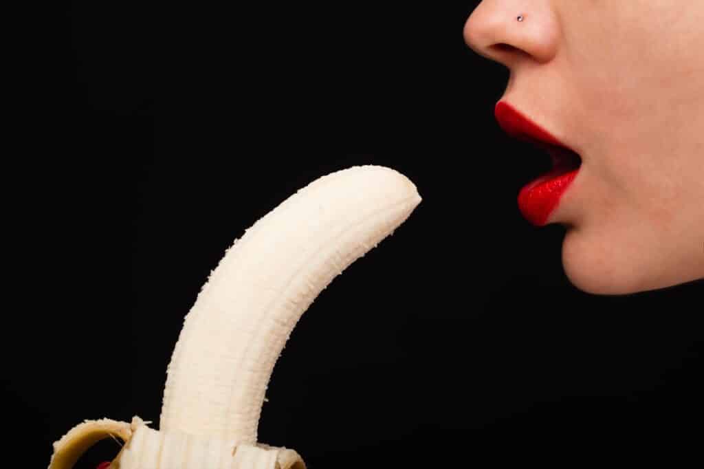 girl eats a banana