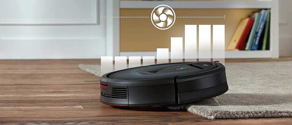 A Roomba in action on a carpet